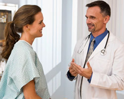 Doctor discussing the patient's surgey with her